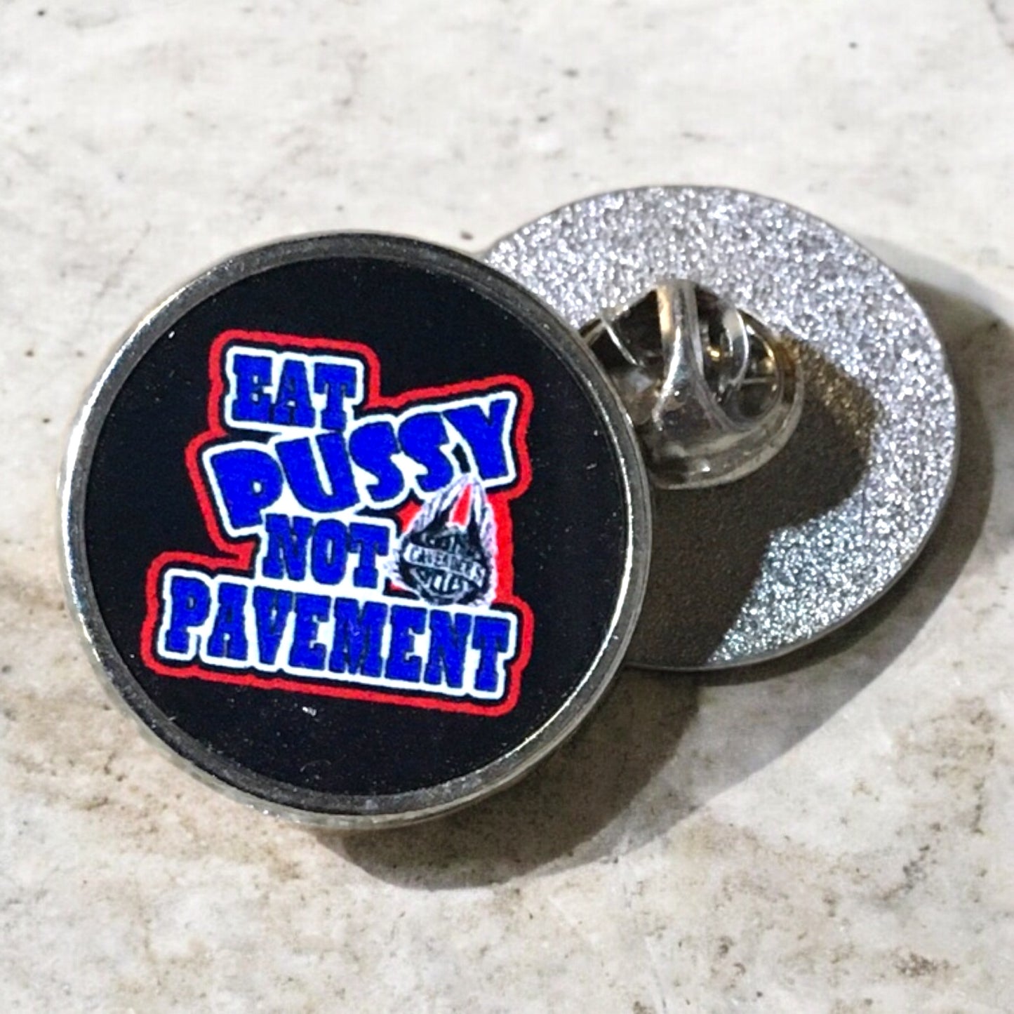 Vest pin with “eat pussy not pavement”